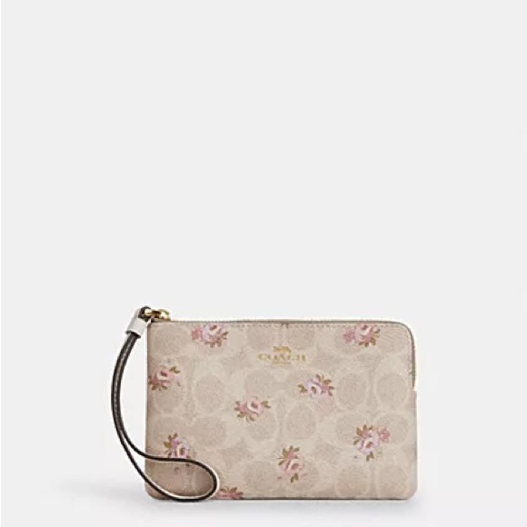 Coach Handbags - Coach Beige Floral Wristlet